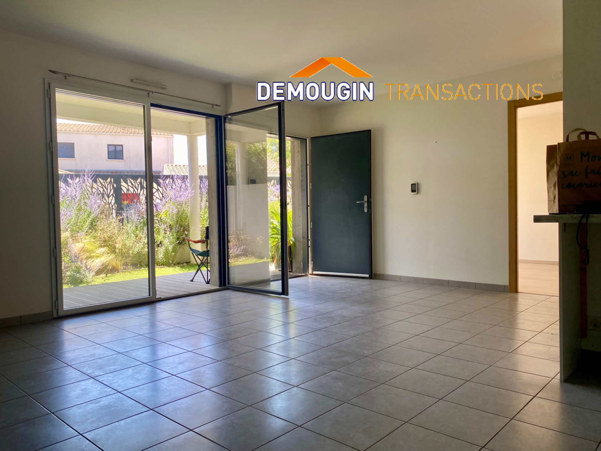 A PROXIMITE IMMEDIATE DU CENTRE VILLE - TYPE 2 AVEC JARDINET PRIVATIF